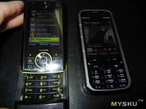Рядом с Nokia 5730
